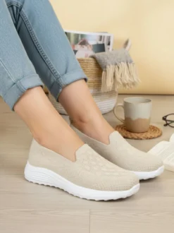 Canguro Sneakers donna slip on in maglia con zeppa - oro