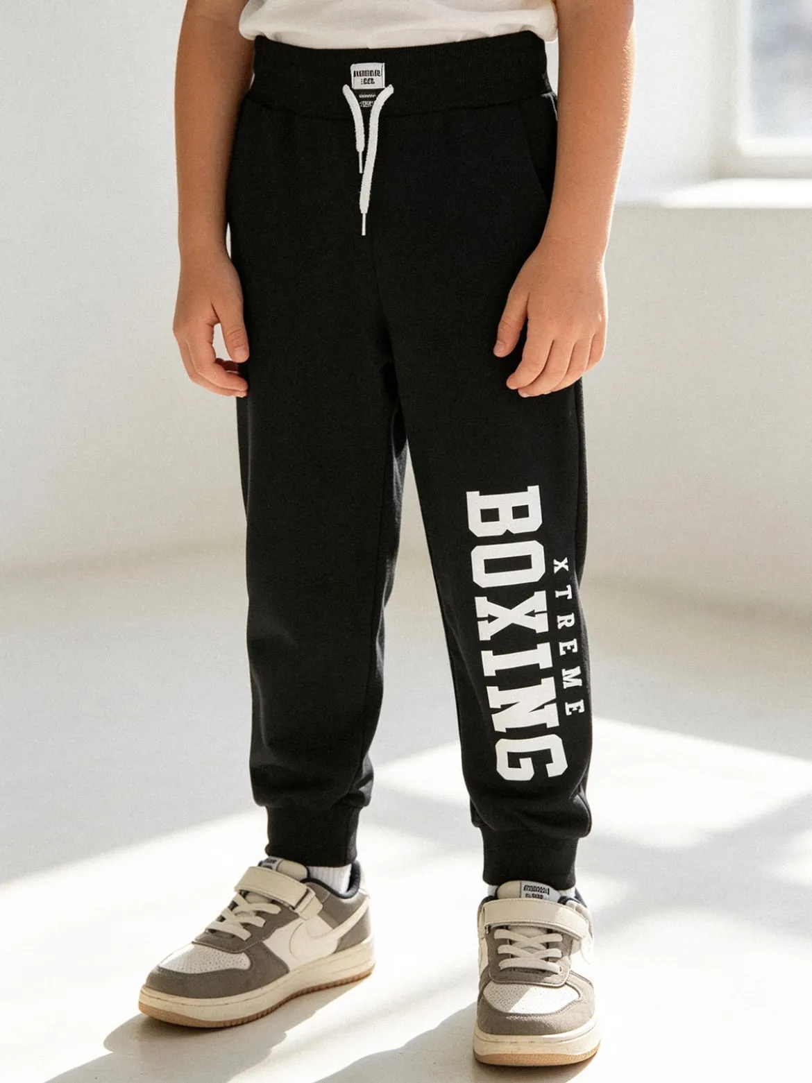Xtreme Boxing Pantaloni sportivi da ragazzo con coulisse e polsini - nero