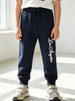 Yi Boy Pantaloni tuta da bambino con polsini e coulisse - blu scuro